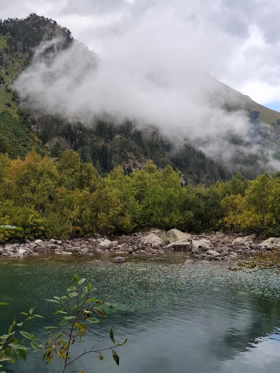 Fog over mountain lake