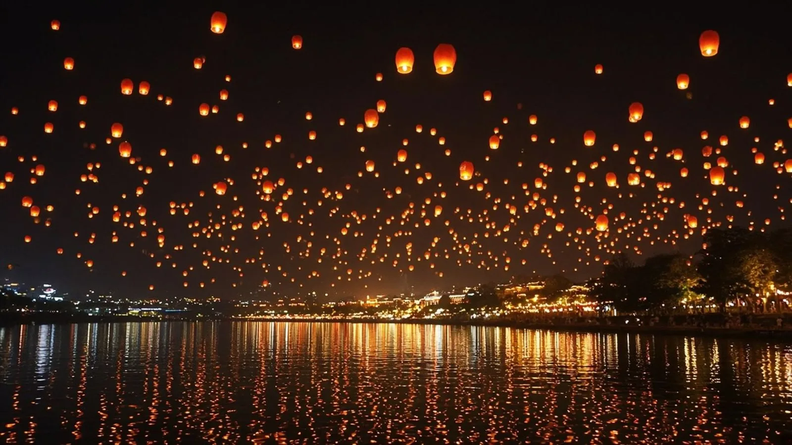 Lantern festival. Hundreds of glowing lanterns rising into the night sky.
