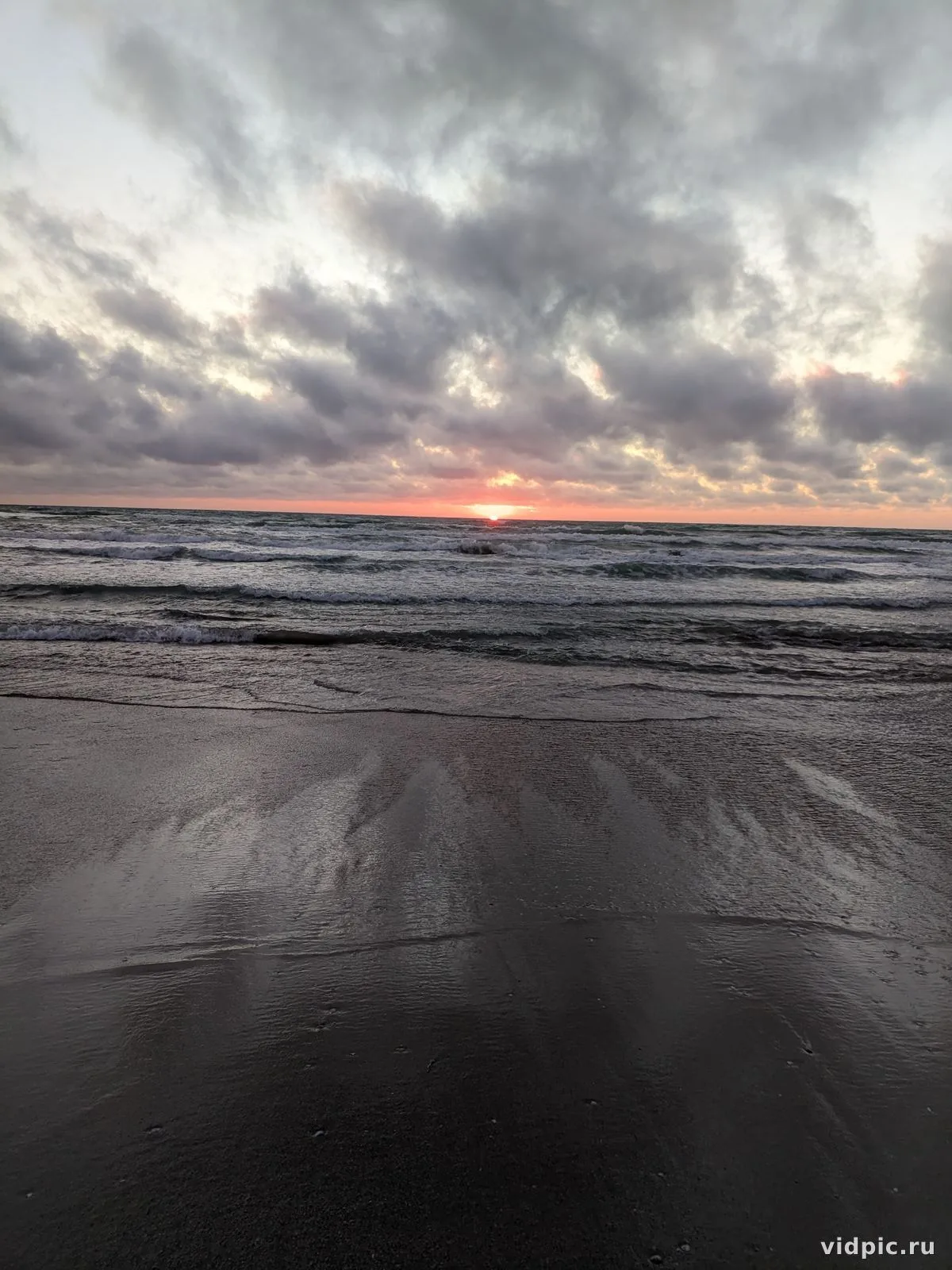 Sunset at sea with clouds